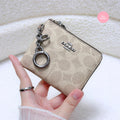 COACH Small Corner Zip Wallet In Signature Canvas | Sand/Taupe
